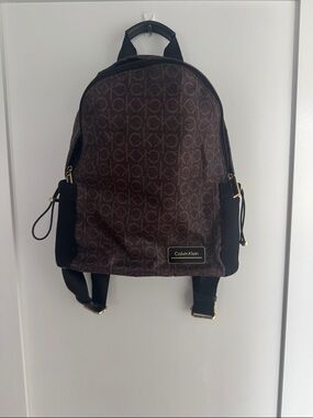Calvin Klein Brown Monogram Backpack with Gold Hardware